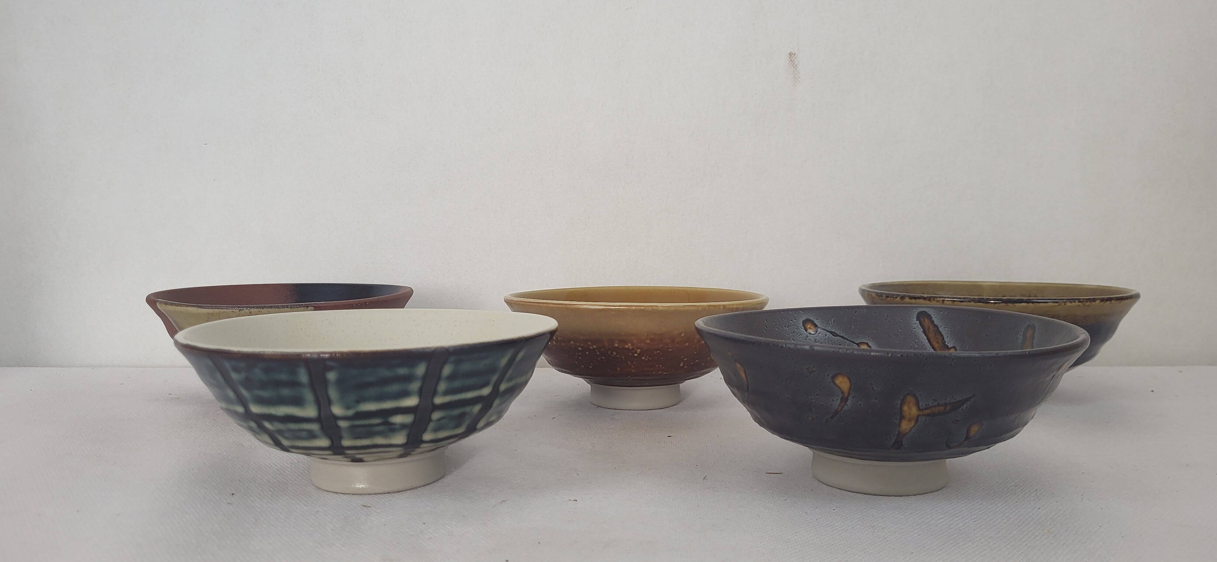 5 stoneware bowls on heels