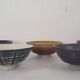 5 stoneware bowls on heels