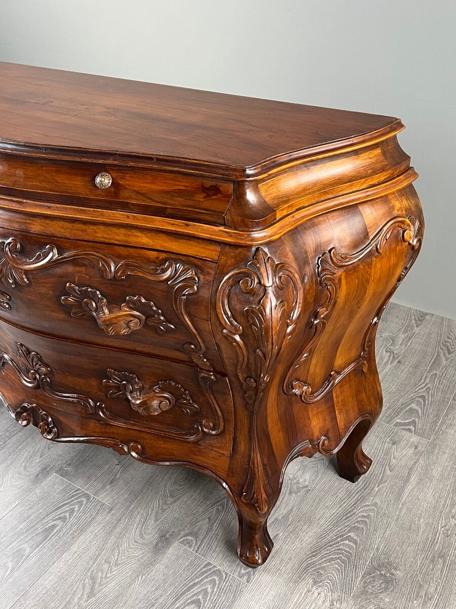 Curved commode in the Louis XV style, carved wood, 19th century.