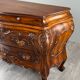 Curved commode in the Louis XV style, carved wood, 19th century.
