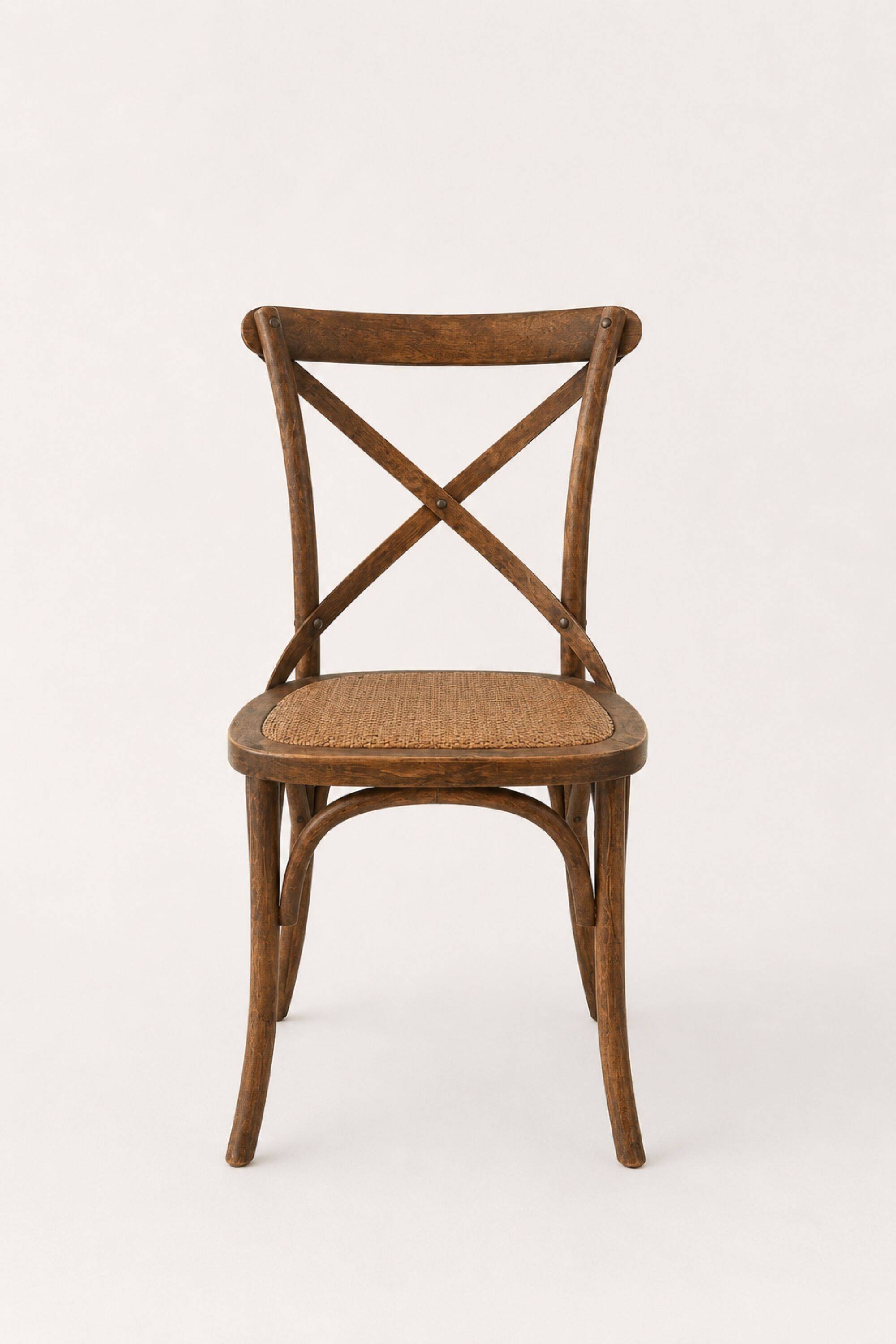 Bistro chairs with cross-back, cane seat.
