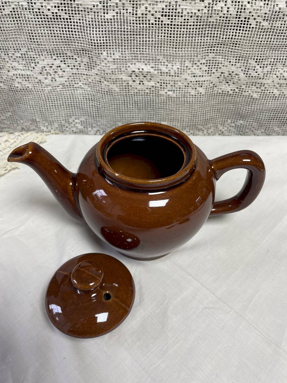 Brown glazed ceramic teapot