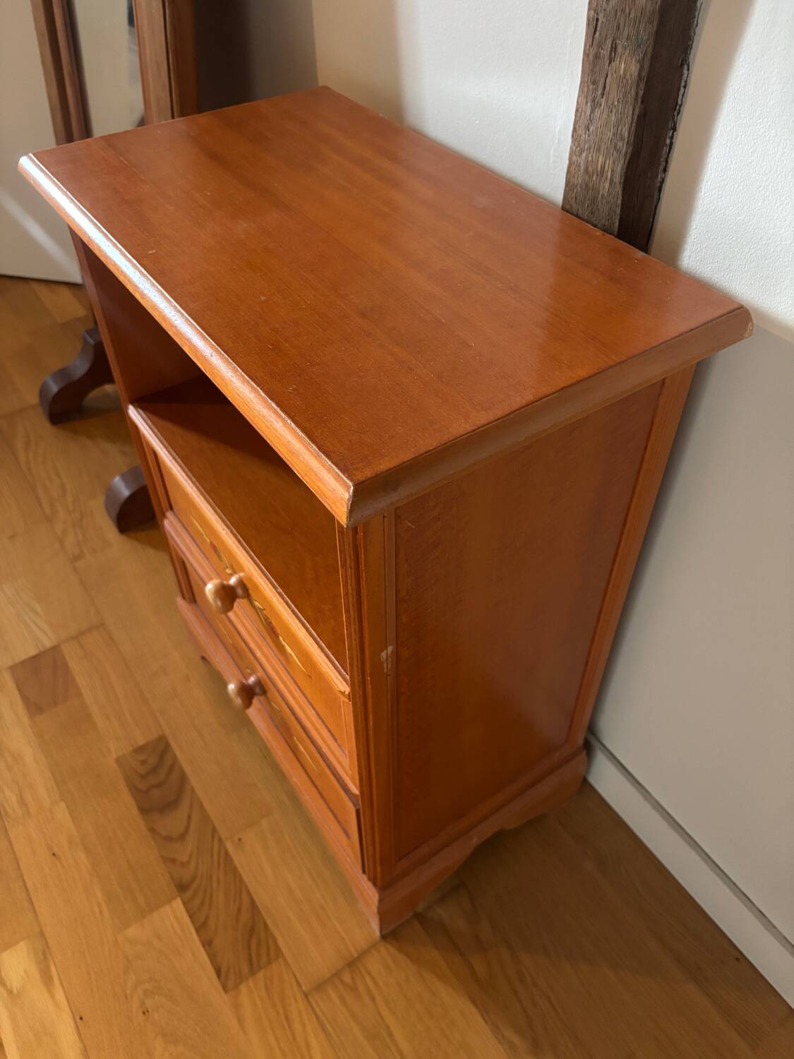 Vintage bedside table with floral decor