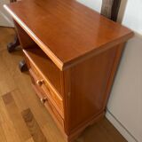 Vintage bedside table with floral decor