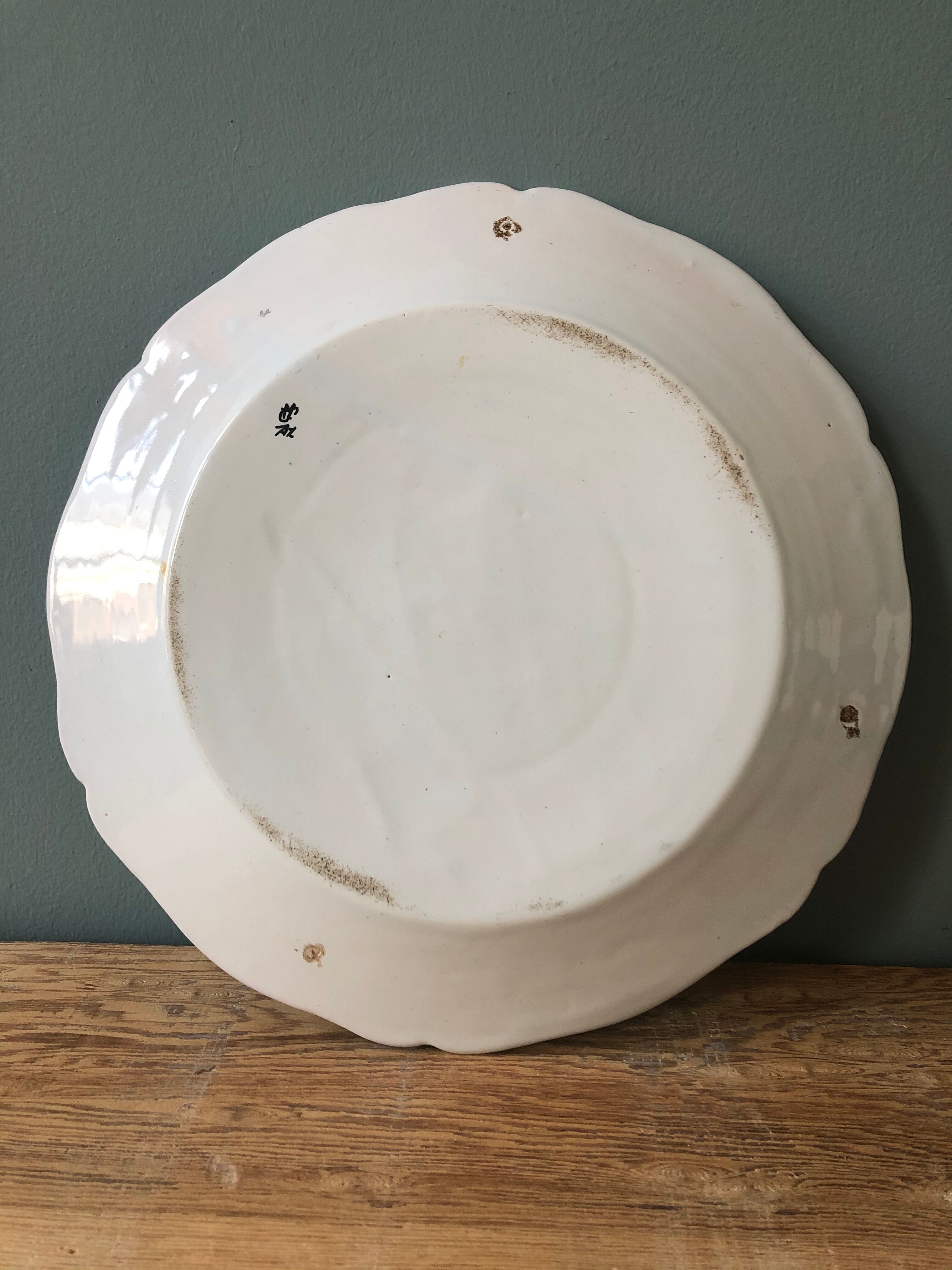 19th century plate in hand-painted earthenware