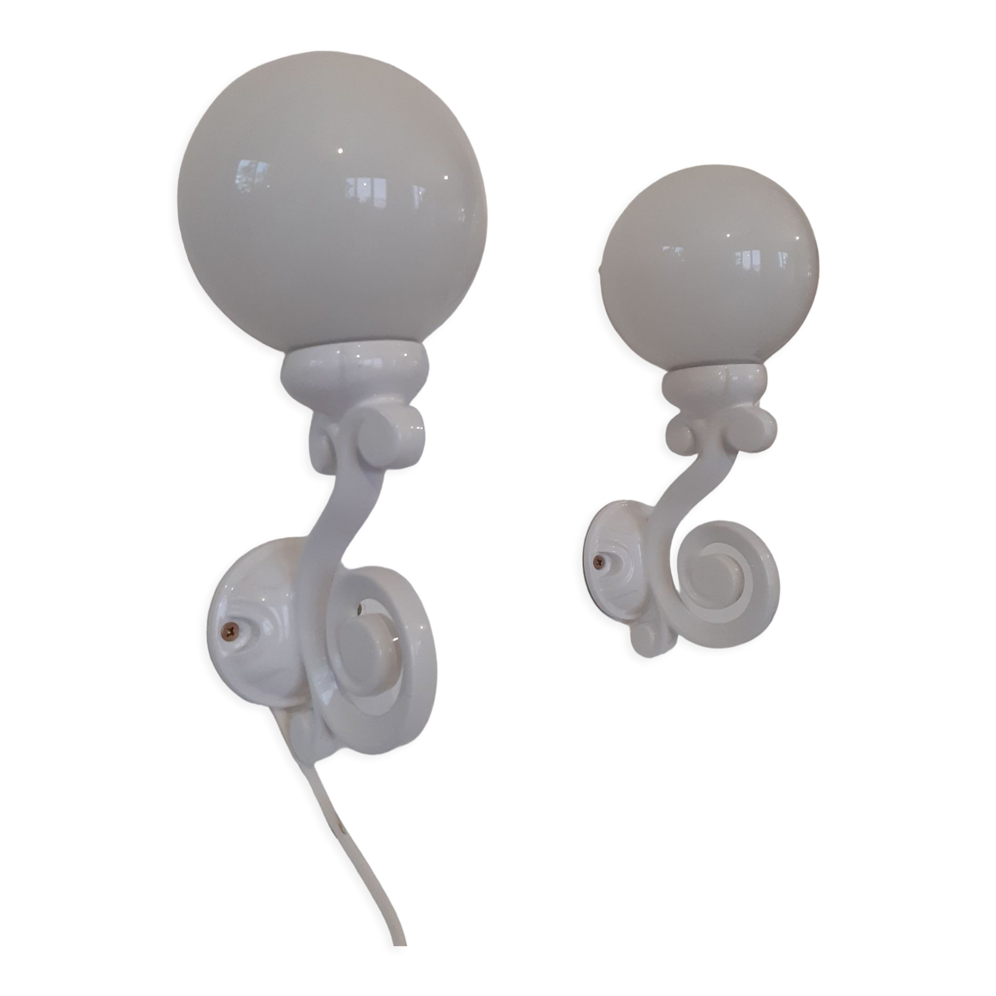 Pair of cast iron sconces