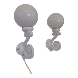 Pair of cast iron sconces