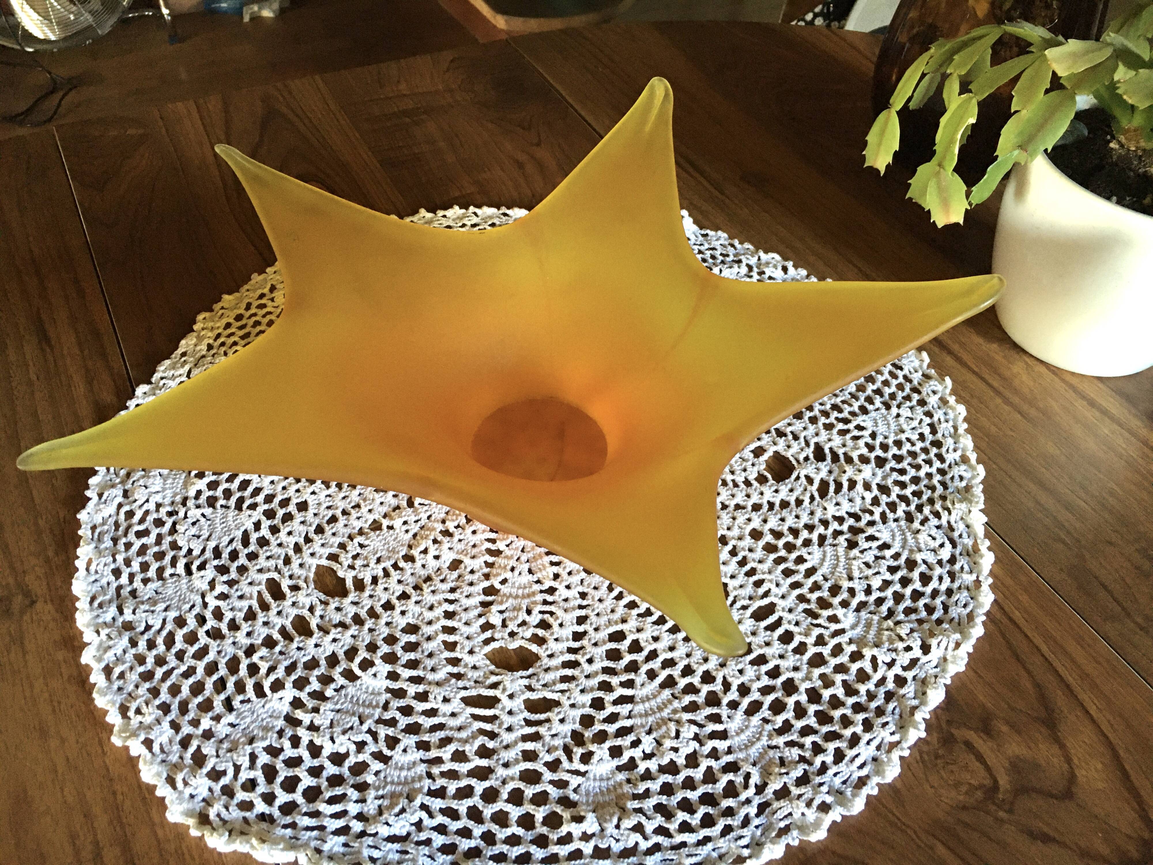 Star in orange glass paste