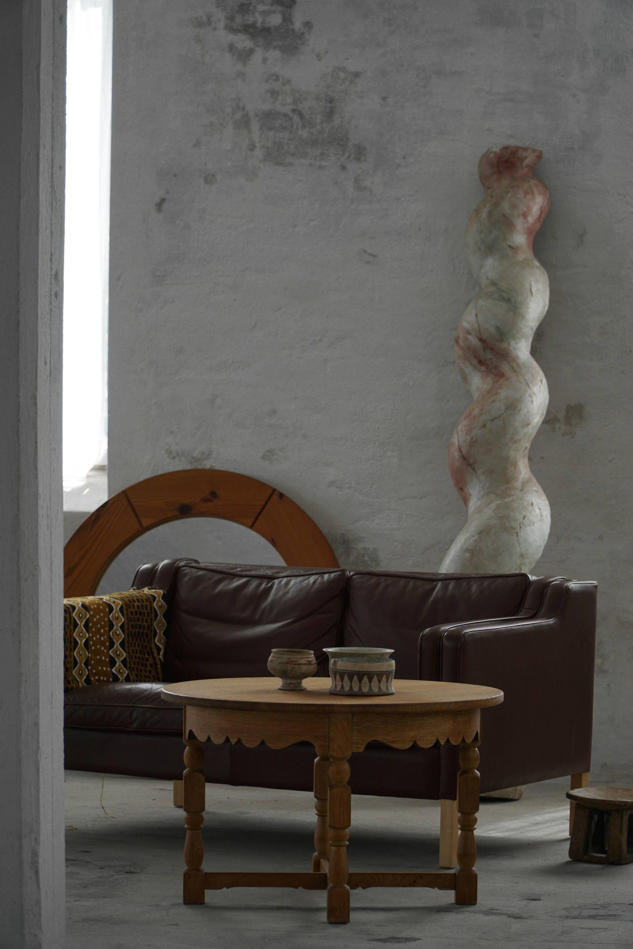 Mid-century Danish round side table in solid oak, Henning Kjærnulf, 1960s.