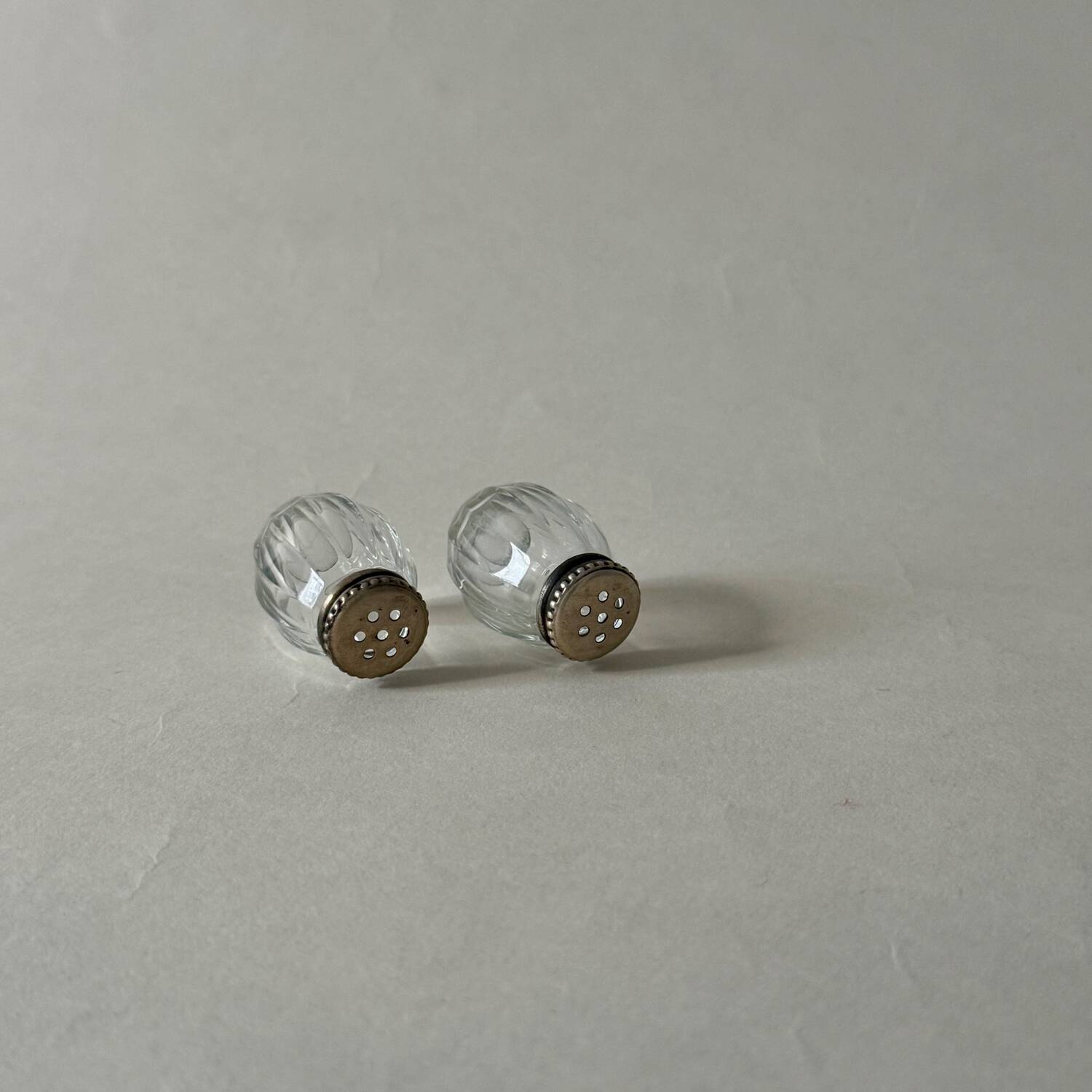 Pair of vintage Christofle glass and silver pearl salt cellars