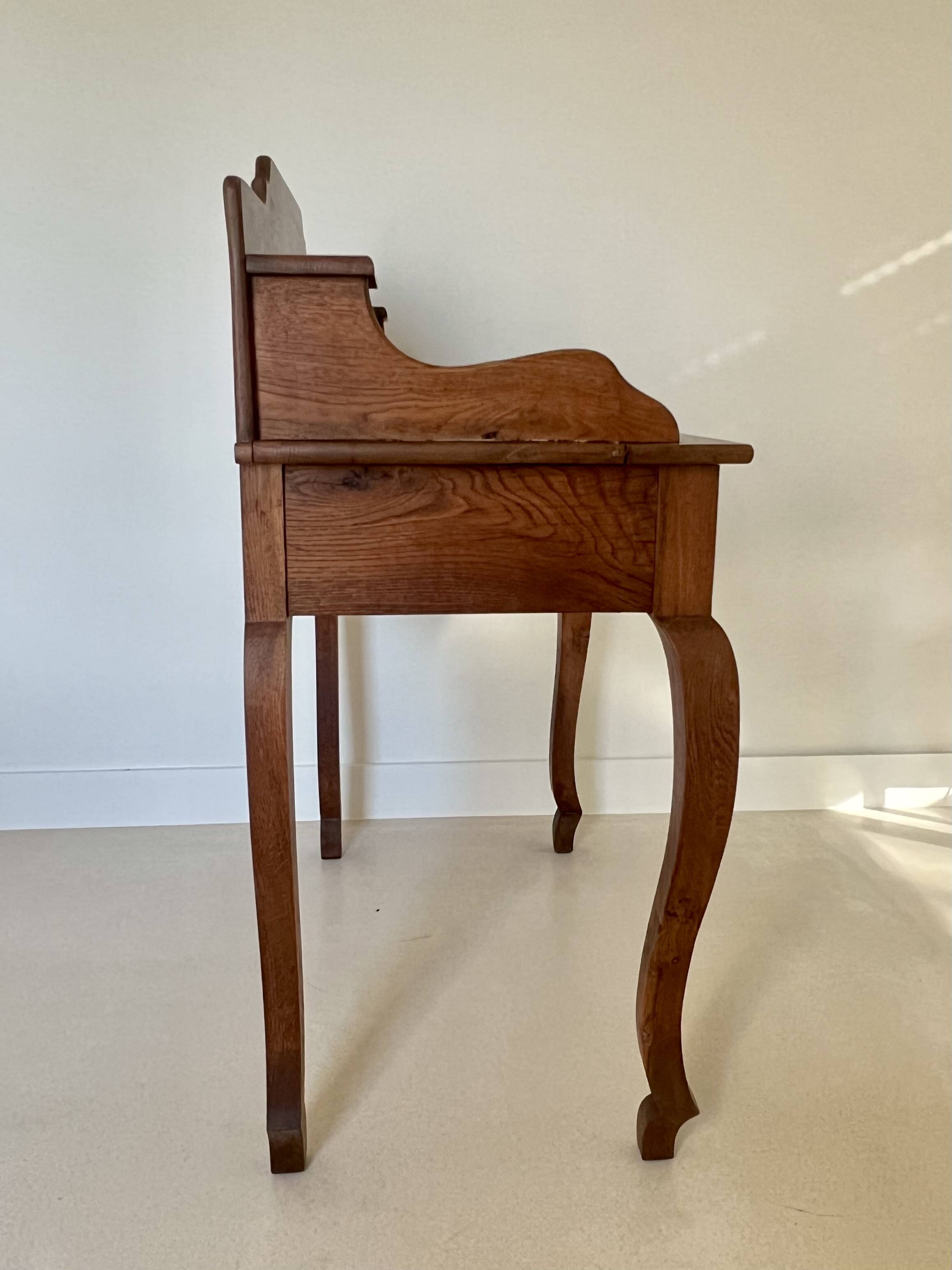 Oak desk in the Louis XV style.