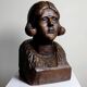 bust of a woman in solid wood carved with a gouge, 19th century