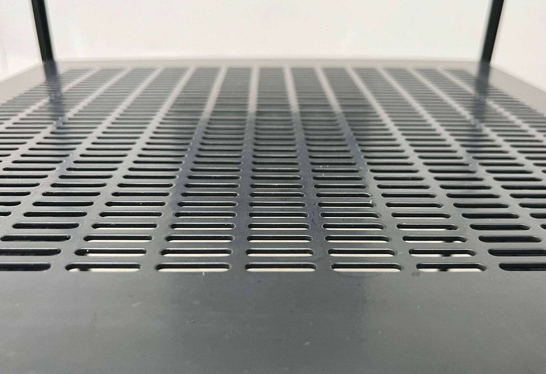 Postmodern black Quinta chair in perforated metal by Mario Botta for Alias, 1980s.