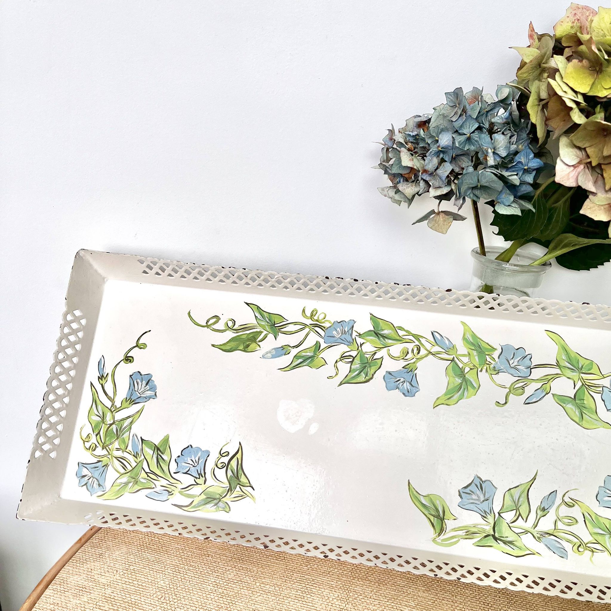 Large painted sheet metal tray with flower decoration