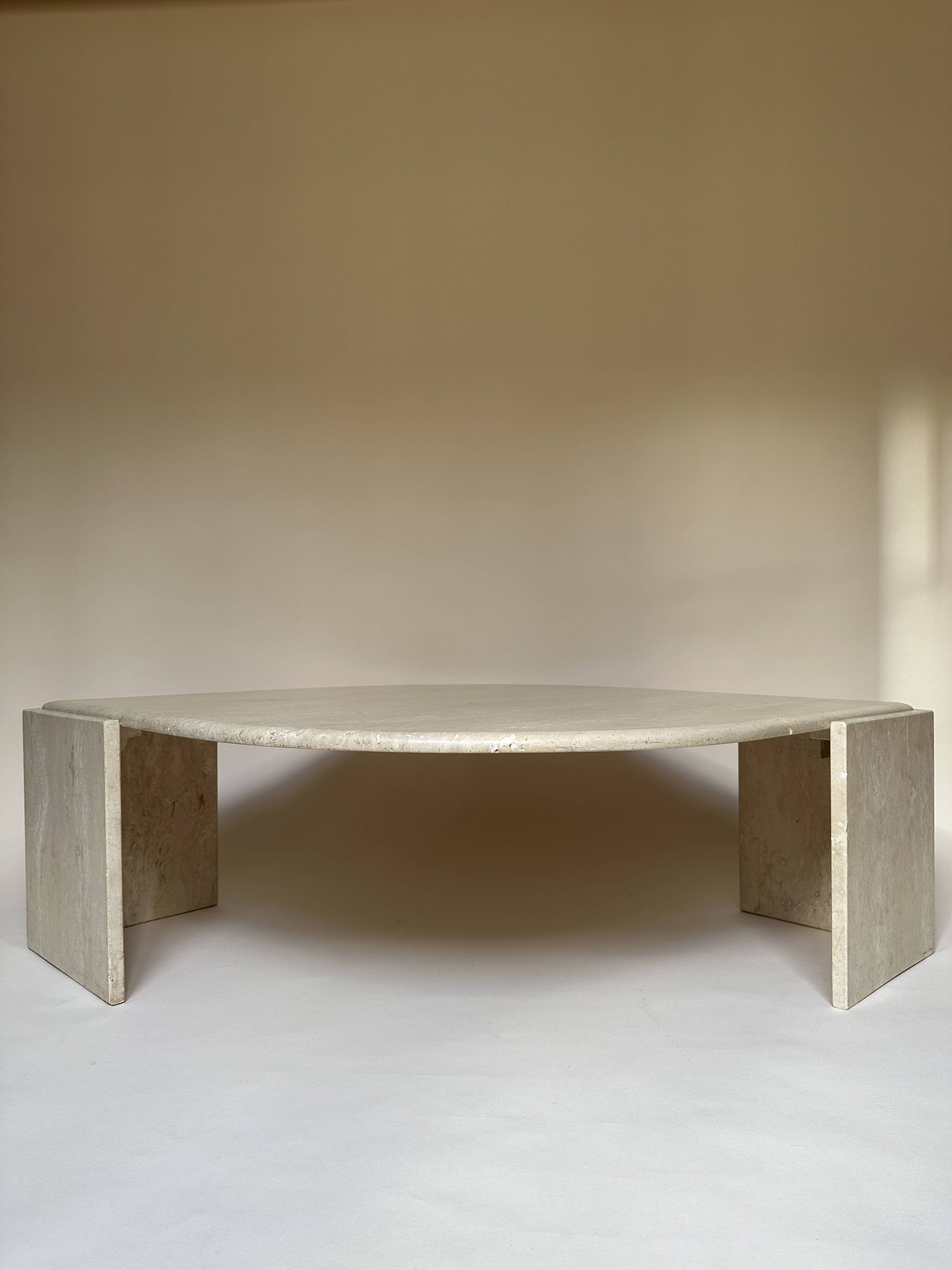 Travertine eye-shaped coffee table
