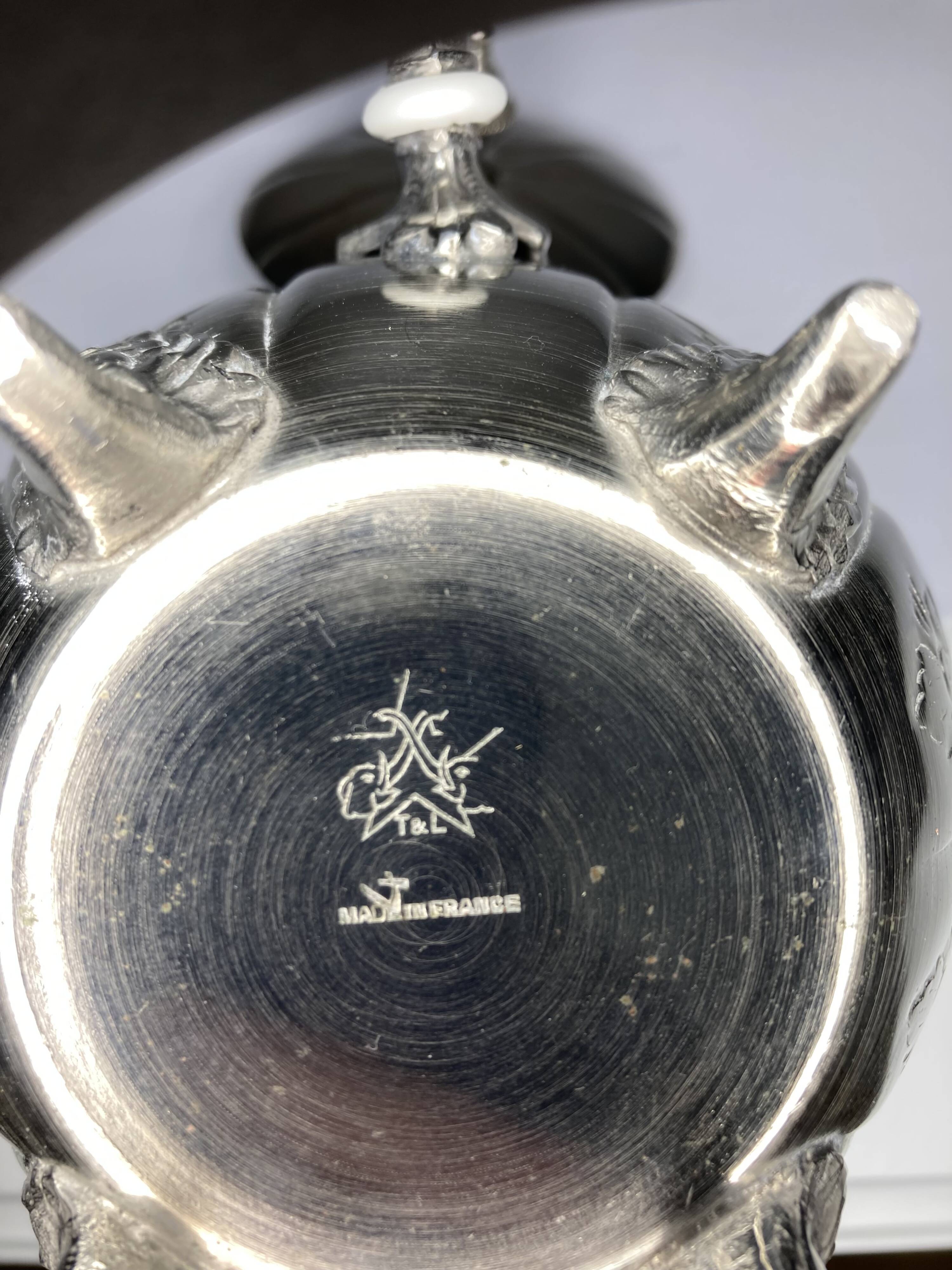 Vintage silver metal teapot from the 1930s