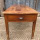 Antique cherry farmhouse table with 2 drawers and 1 pull-out