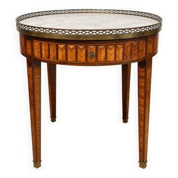 Bouillotte table in Louis XVI style with marquetry, marble, and brass.