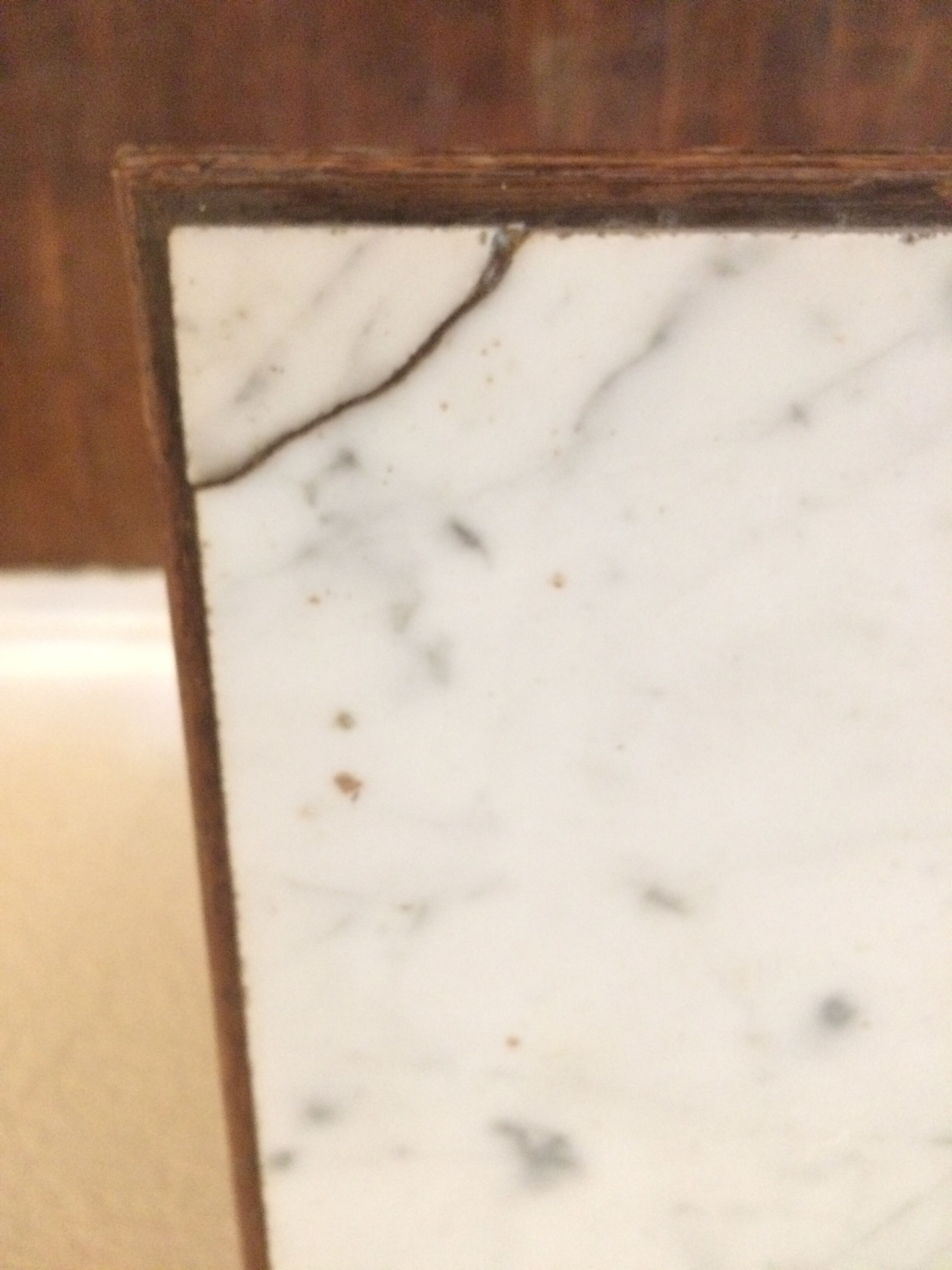 Wooden and marble bedside