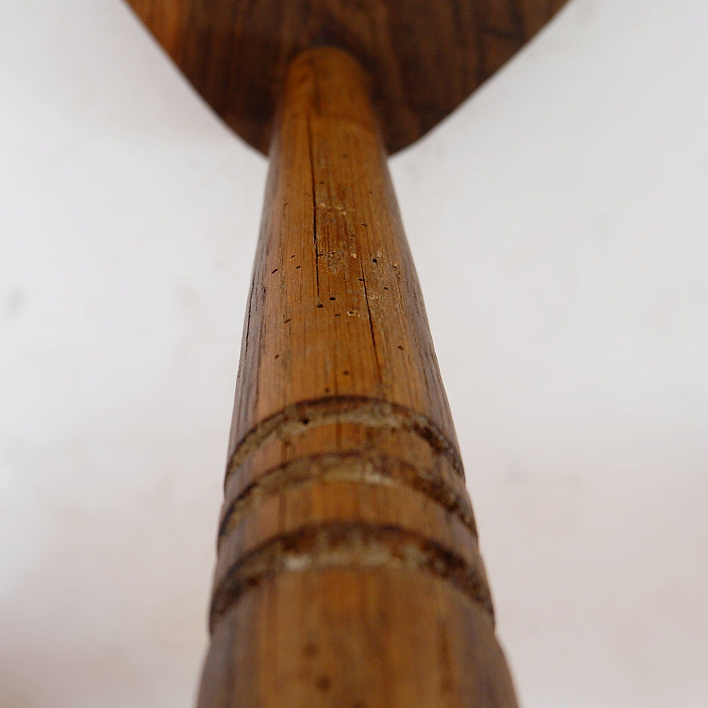 Rustic tripod stool with a triangular seat, 1960s.