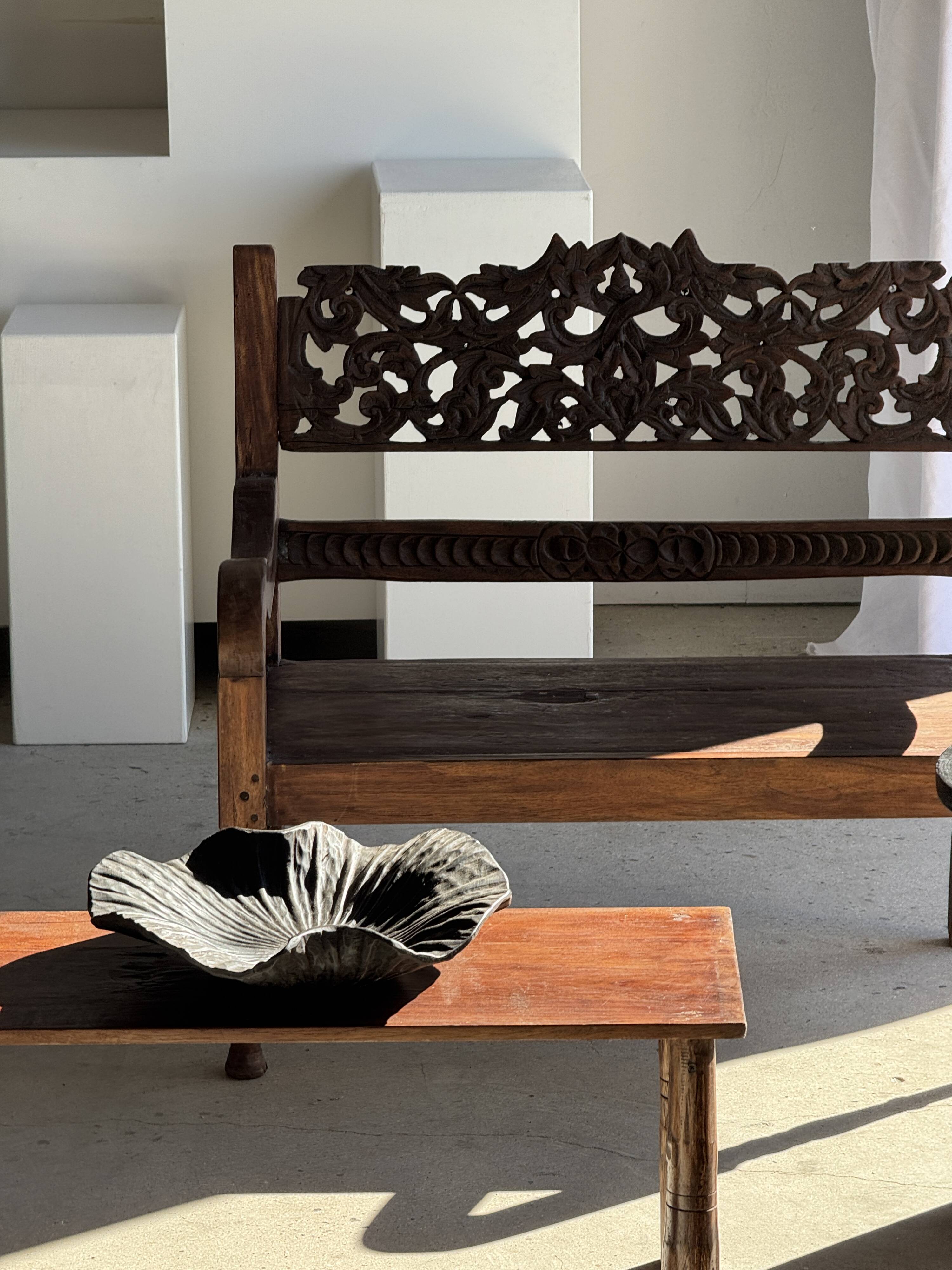 Black solid mango side table (monoxyle) with conical legs