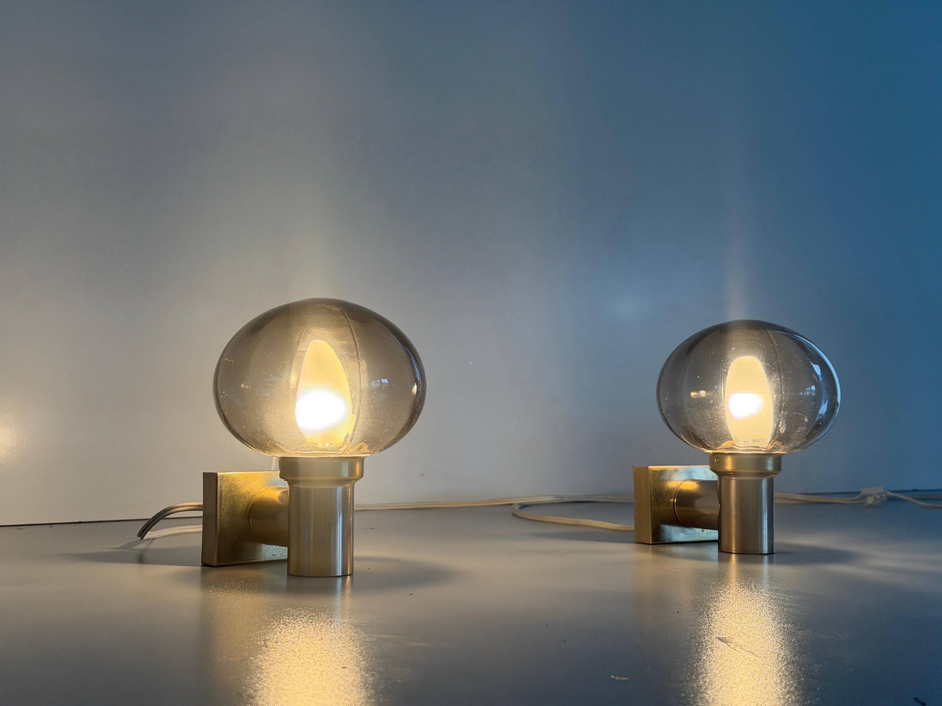 Pair of grey glass and chrome wall lights from the mid-century by N Leuchten, 1960s, Germany.