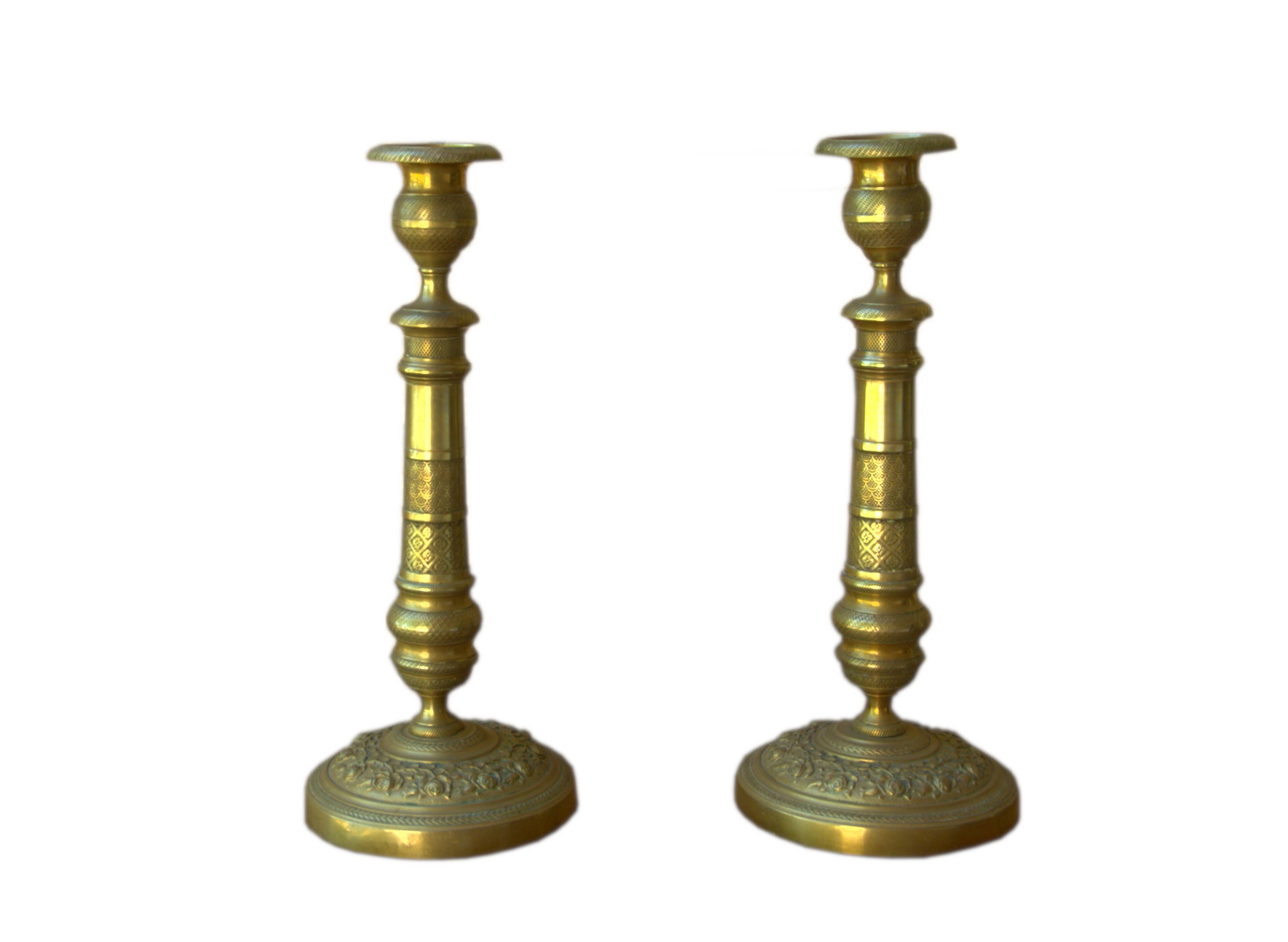 Pair of French neoclassical brass candlesticks, 19th century, 12x29cm