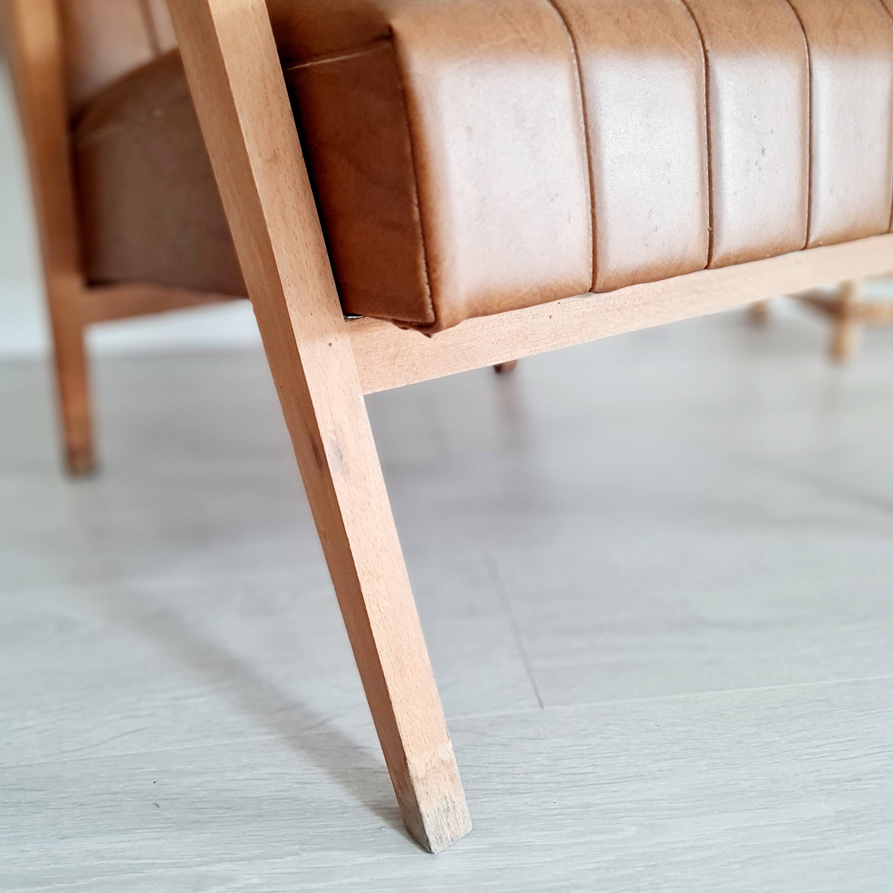 Scandinavian armchair with camel compass legs