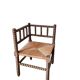 Fauteuil d'angle paillé style arts and crafts