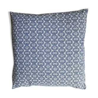 Blue cushion with royal pattern