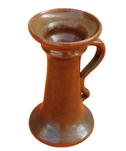 Varnished terracotta spool candlestick