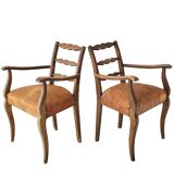 Pair of vintage leather armchairs