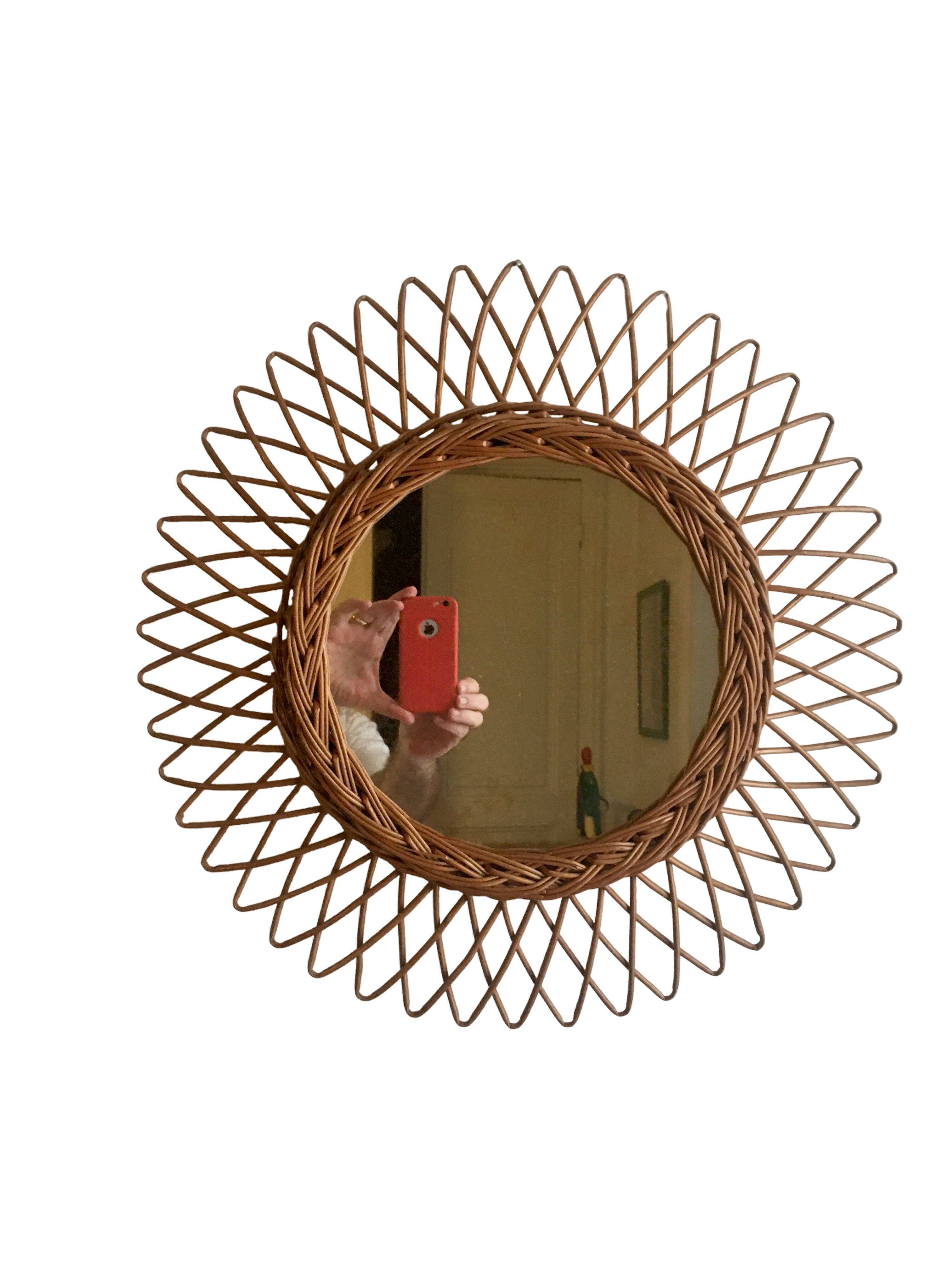 Vintage rattan sun mirror