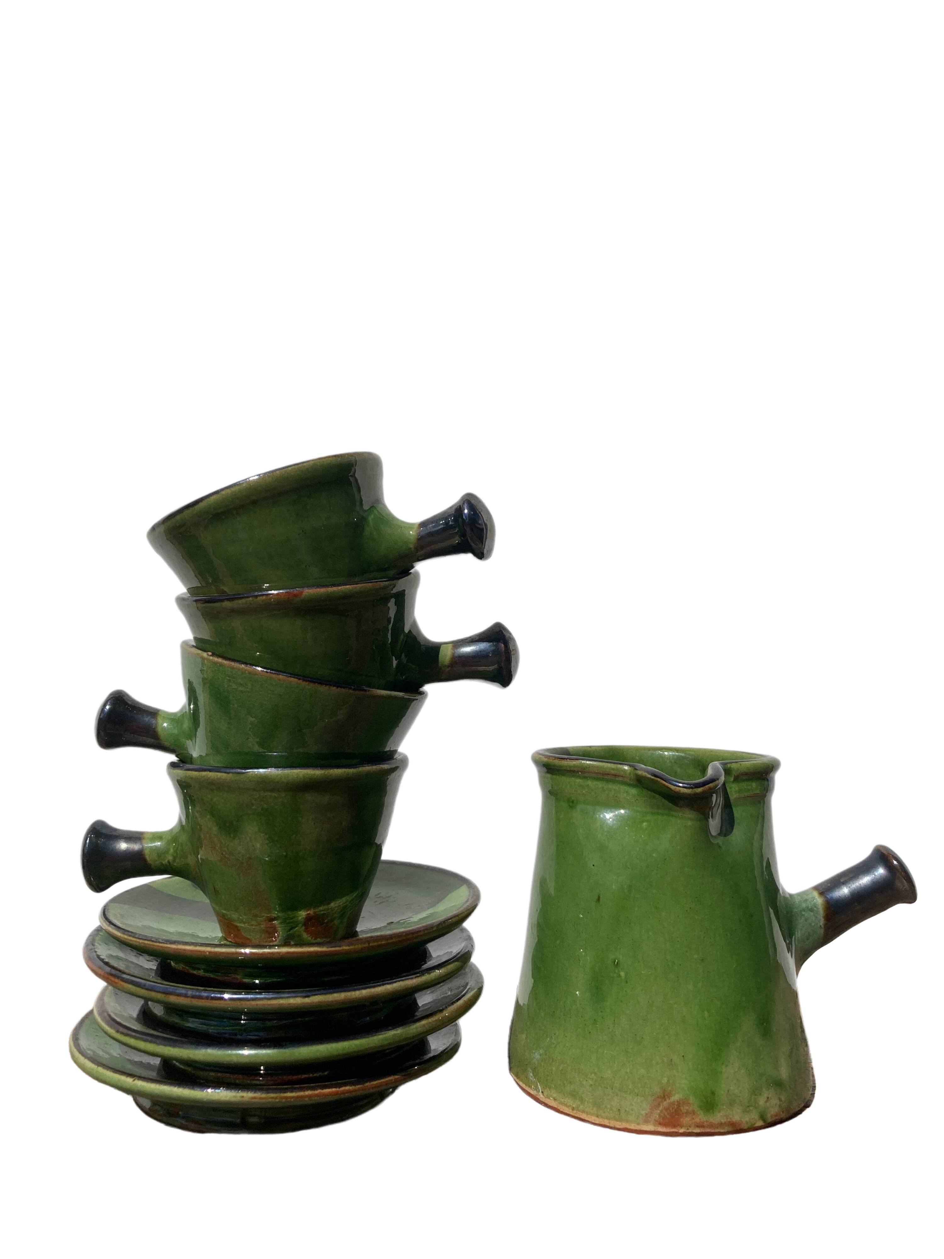 Coffee service signed Poterie de Marnaz including cups and pitcher in glazed terracotta