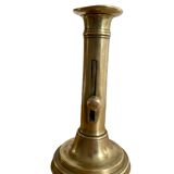 Nineteenth-century brass pull-out candle holder