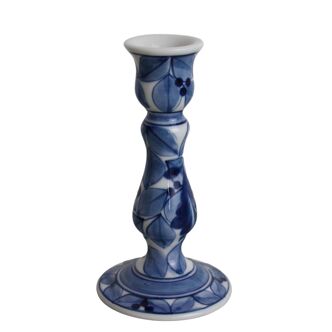 Ceramic candle holder with blue leaves
