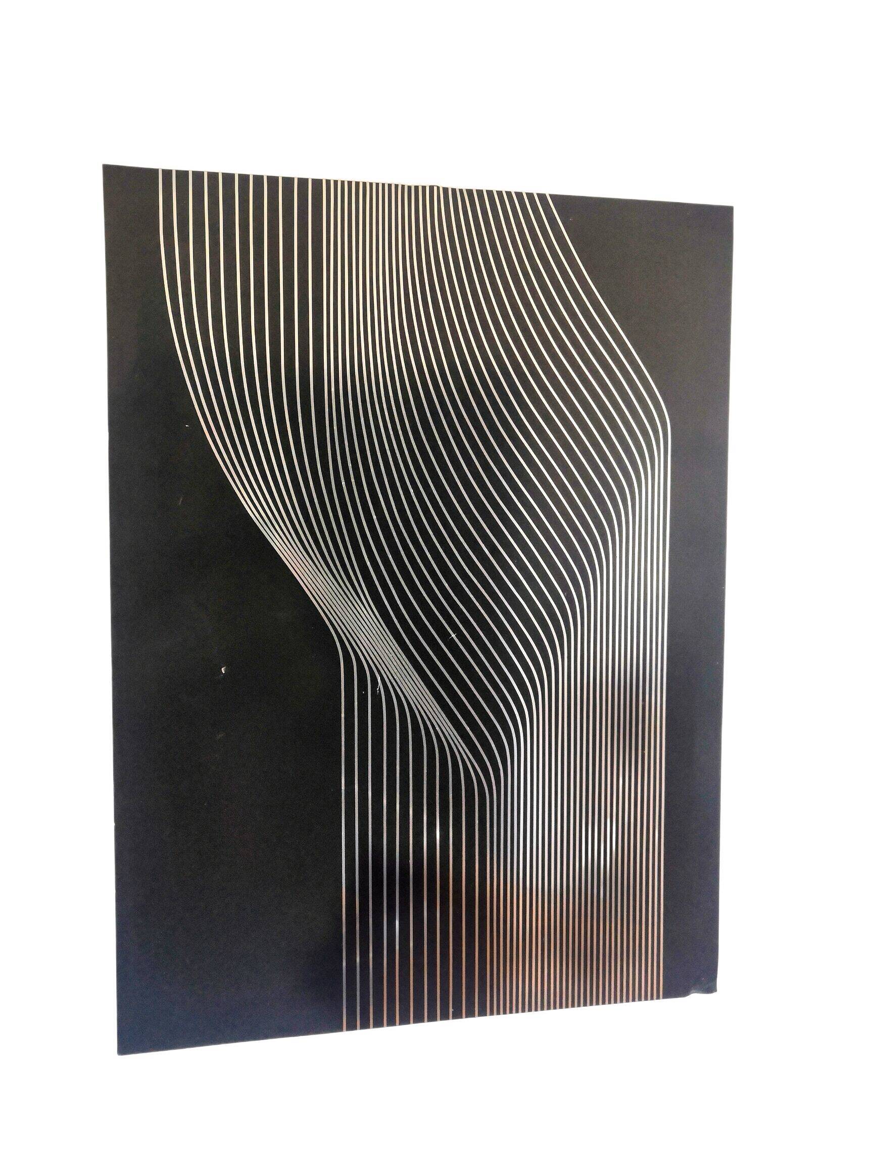 Vintage kinetic table on stainless steel plate