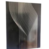 Vintage kinetic table on stainless steel plate