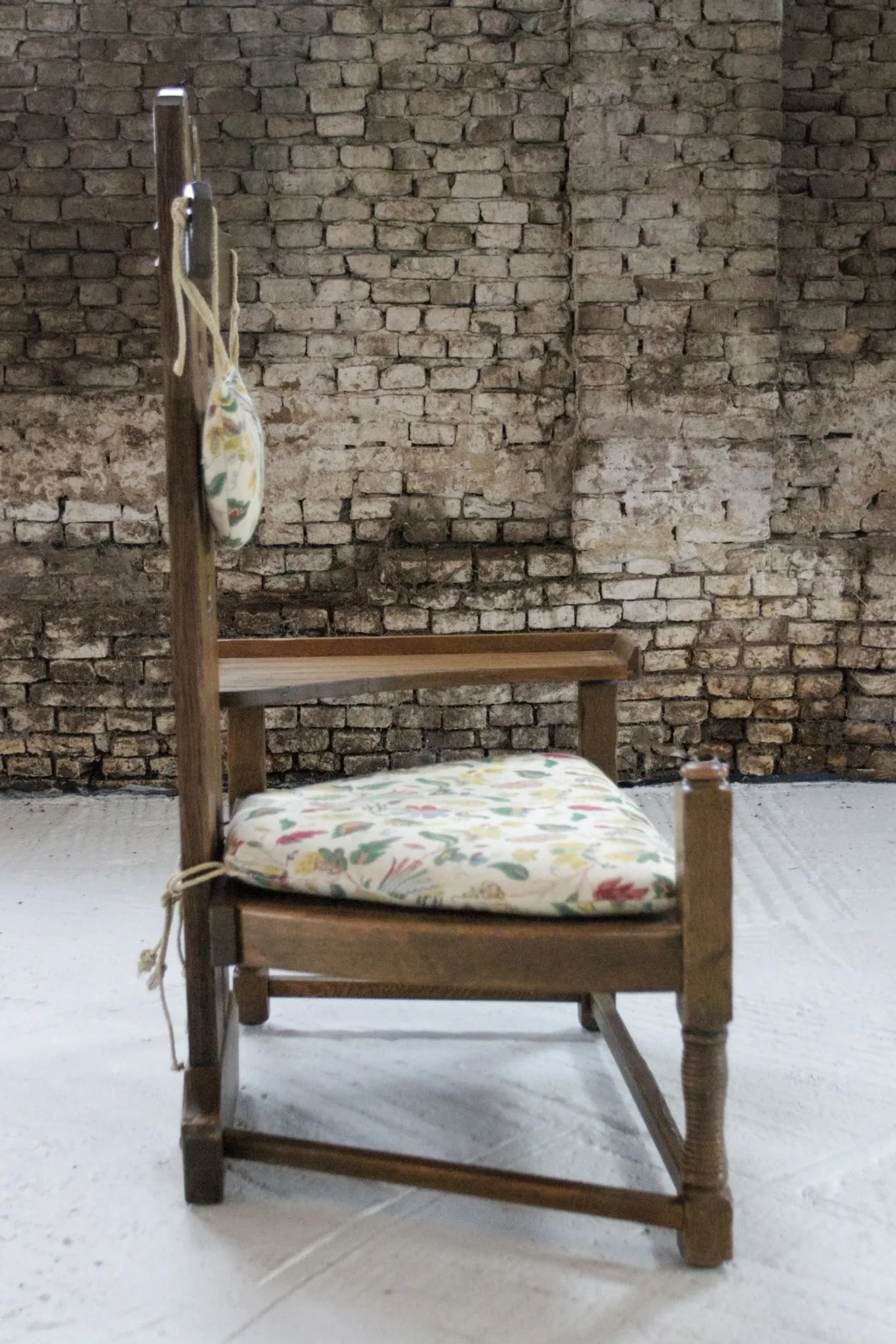 Rare Dutch brutalist oak armchair with integrated side table – 1950s