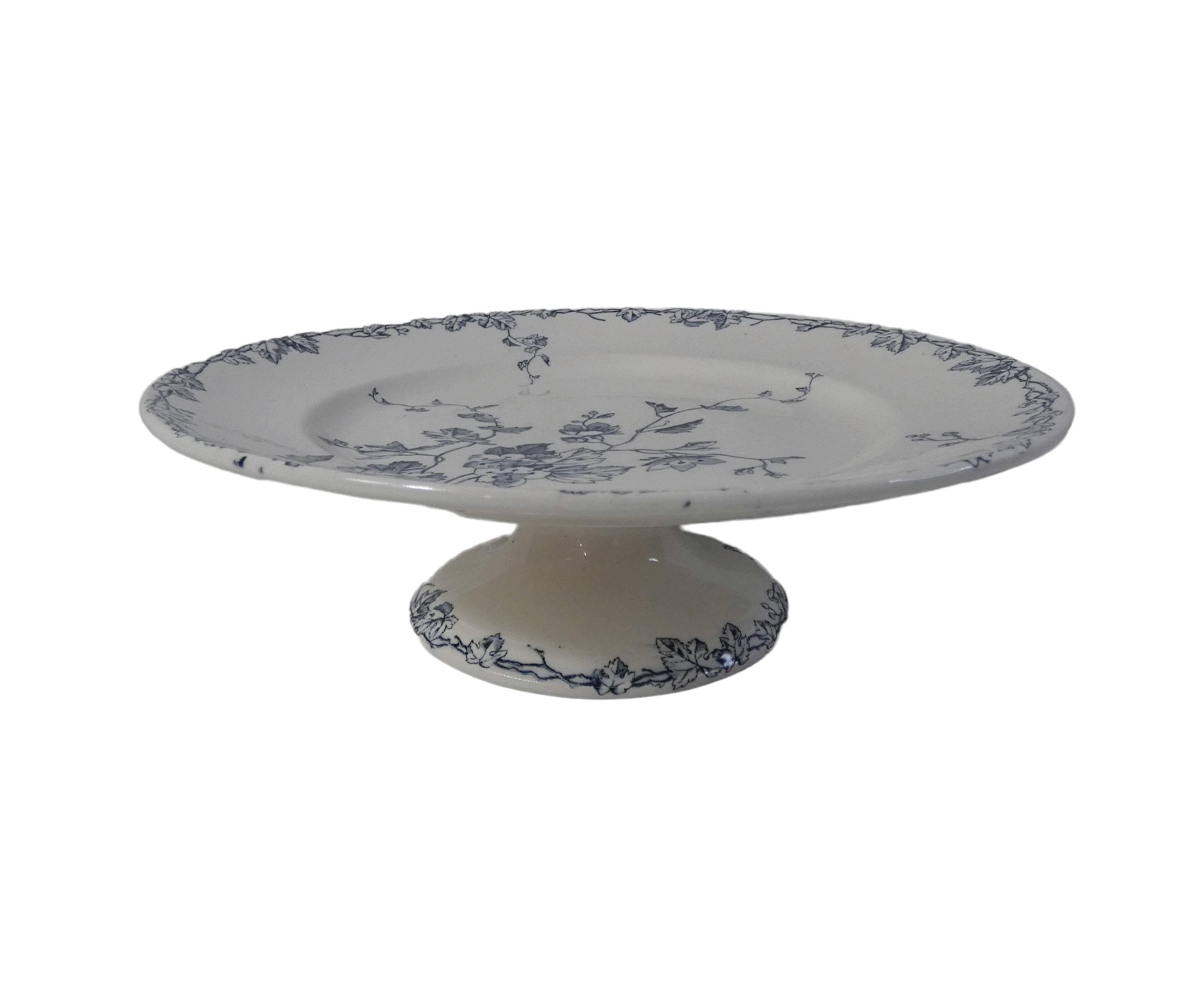 Iron earth old plate on foot compotier spring