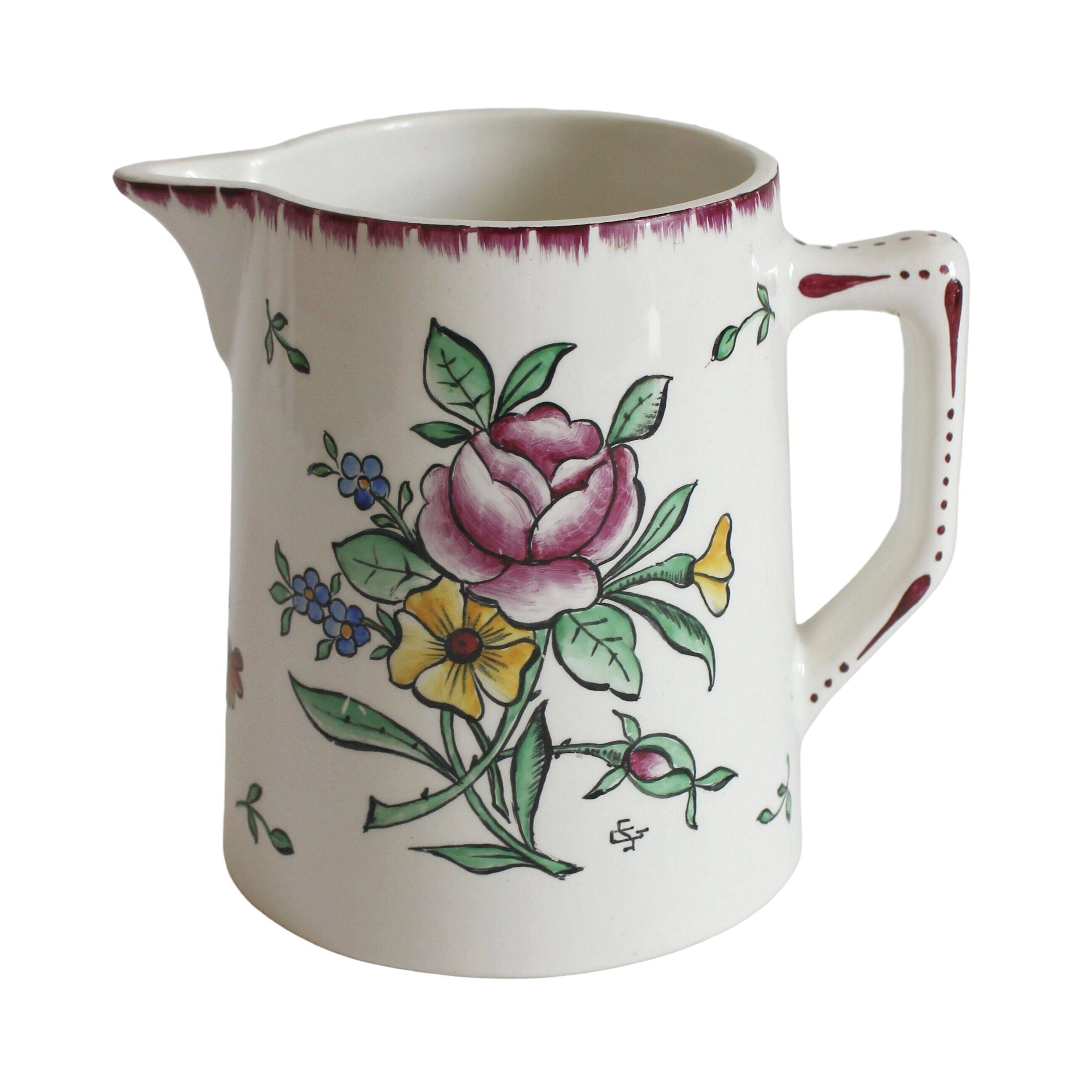 Earthenware jug with floral decoration from Digoin Sarreguemines.