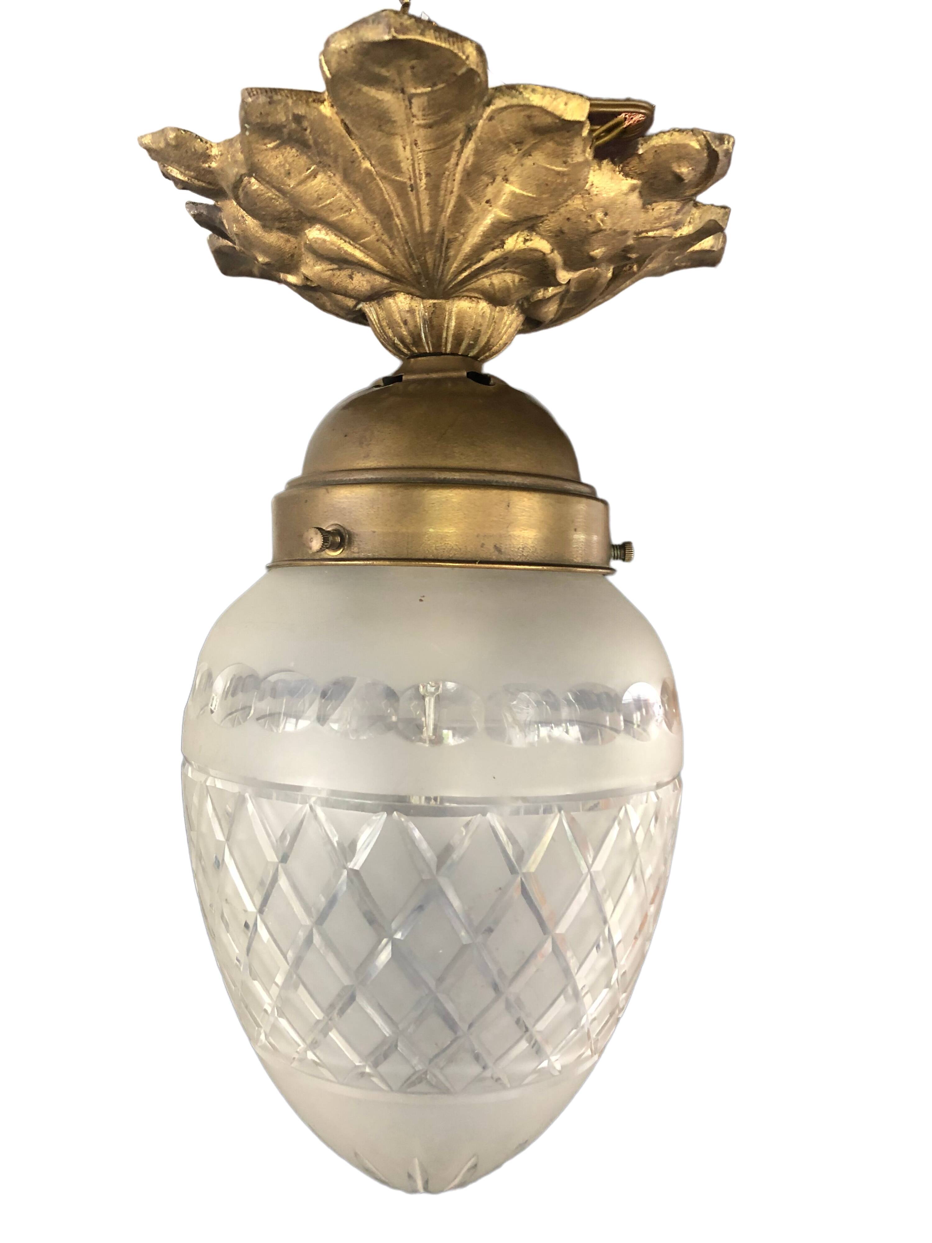 Bronze ceiling lamp and glassware