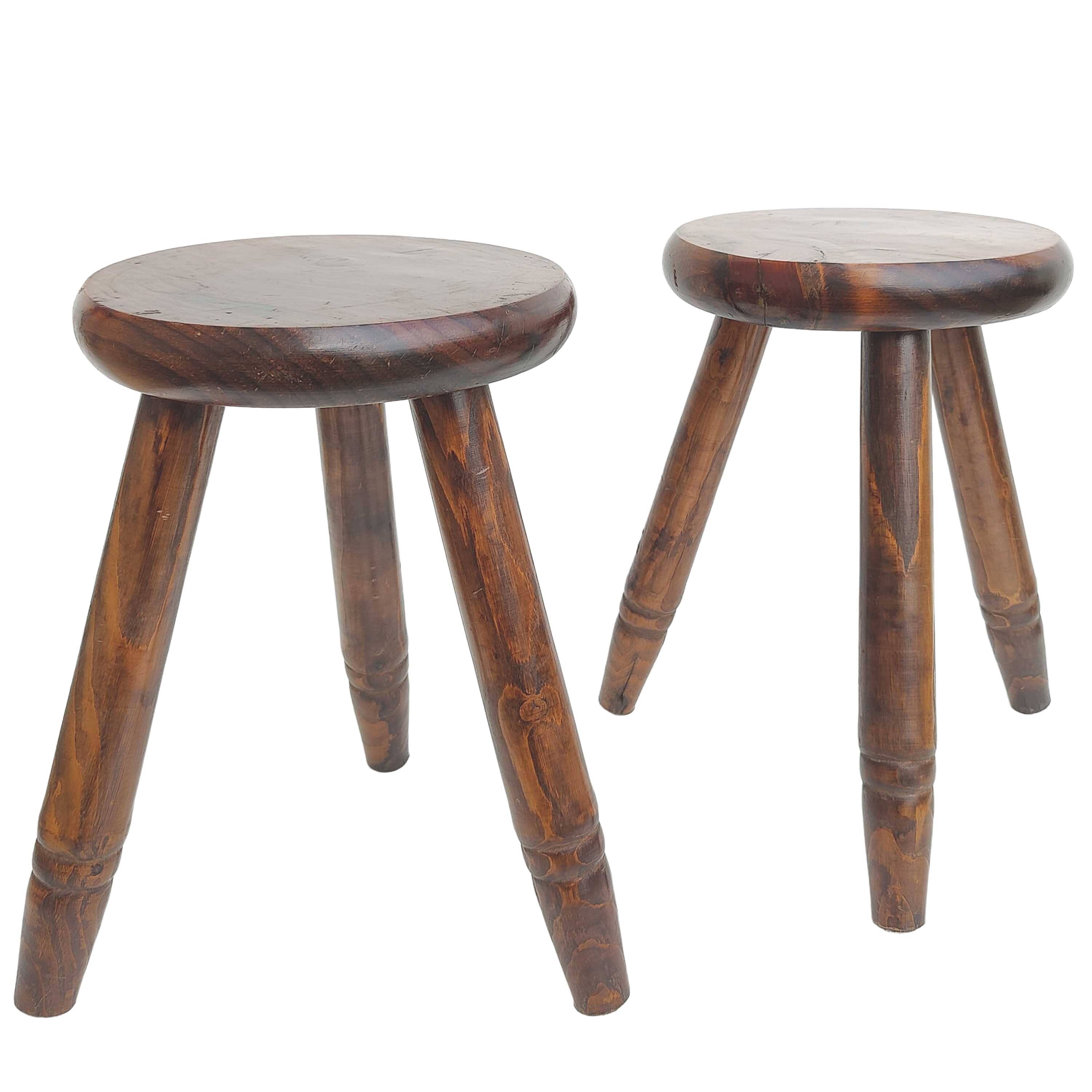Pair of wooden tripod stools