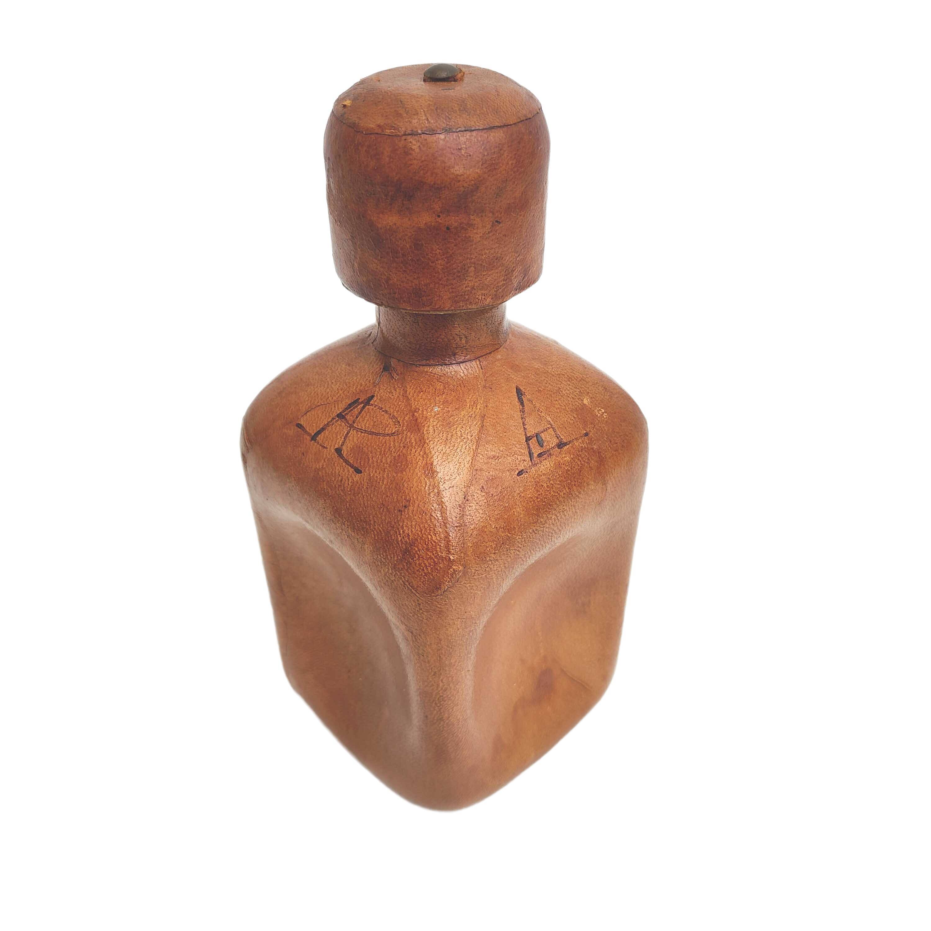 Vintage whisky decanter bottle glass and leather Havana color