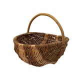 Old handmade basket in woven wicker