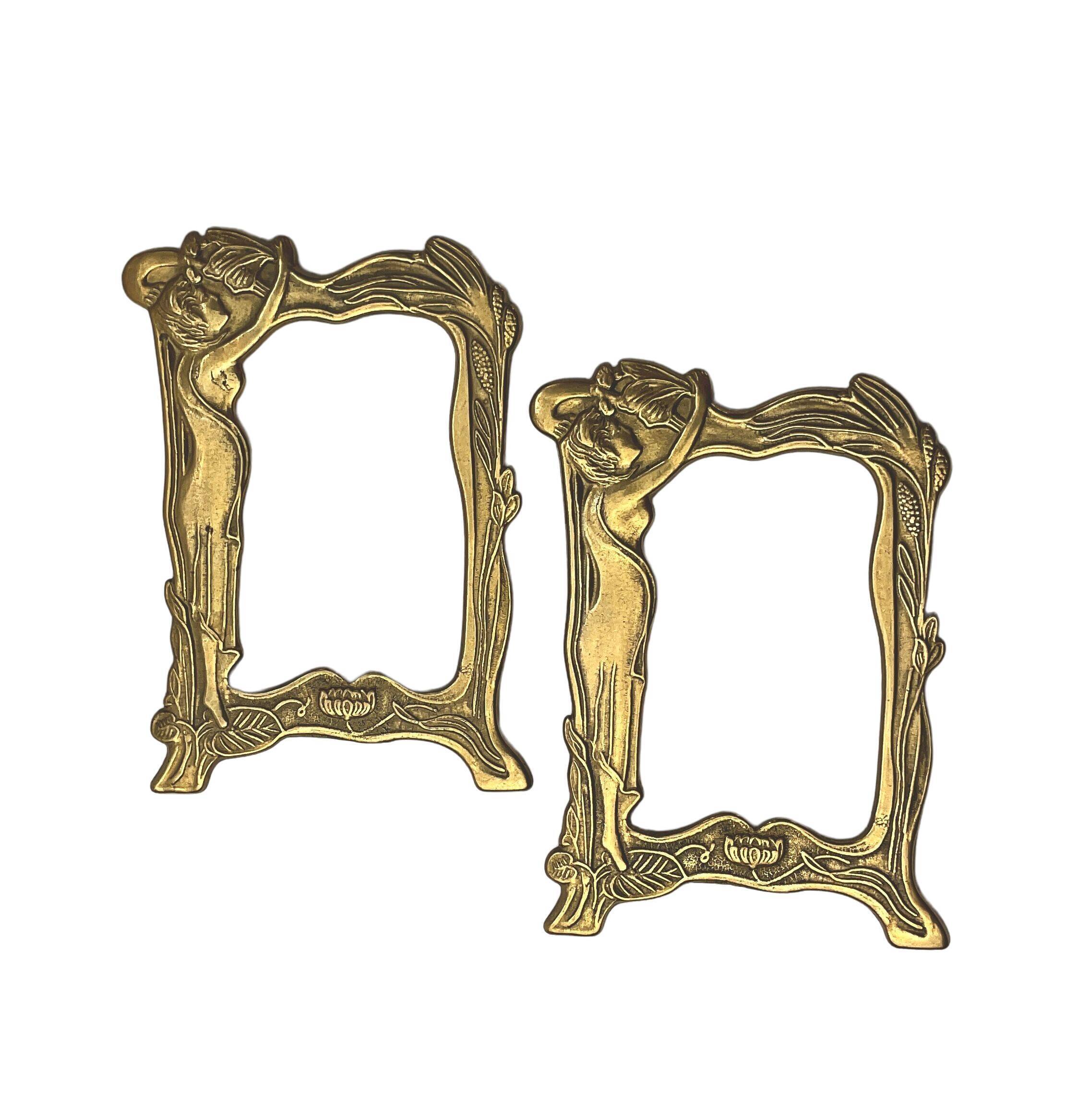 Pair of brass frames with Art Nouveau style woman