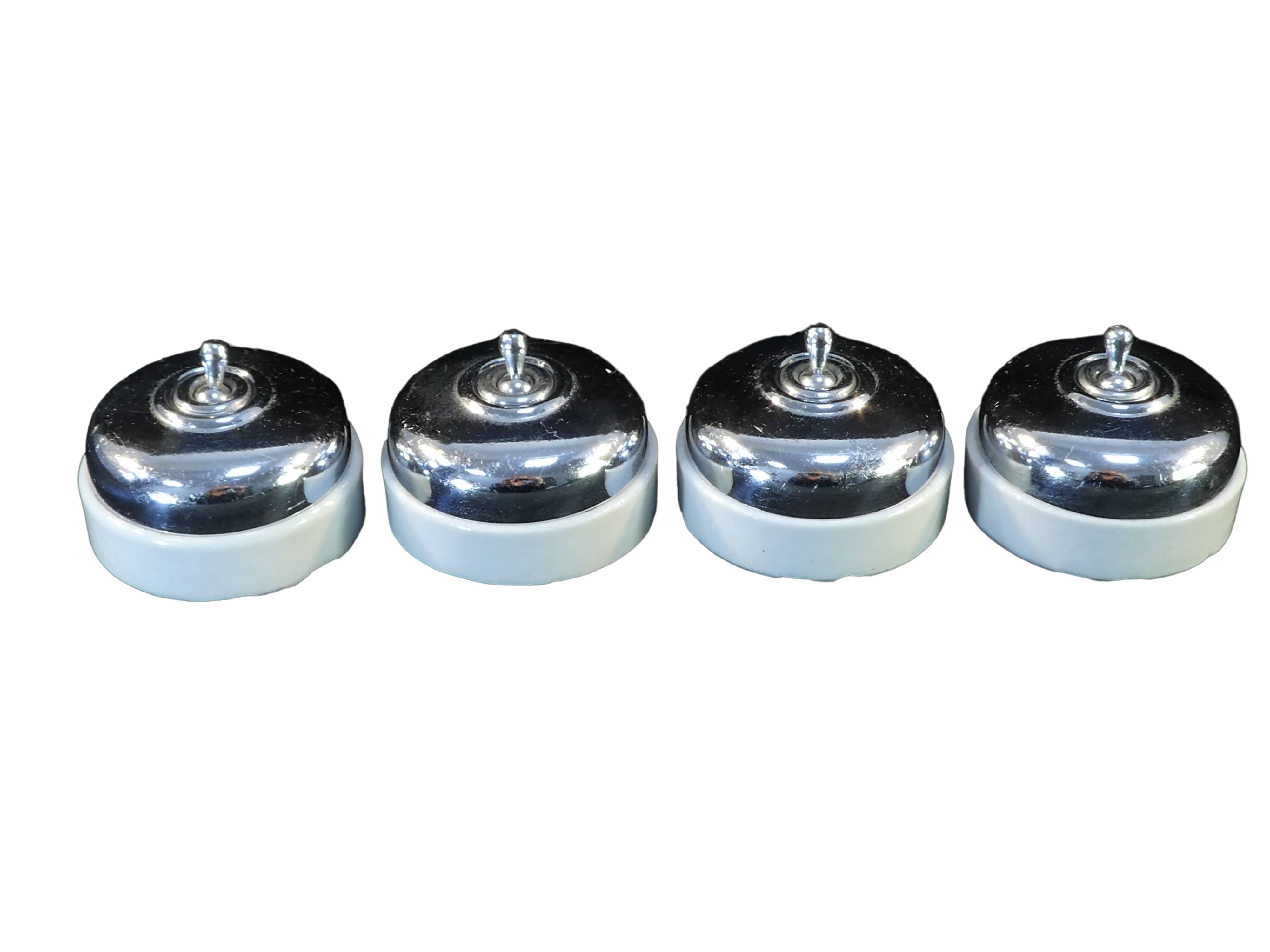 Set of 4 old porcelain and chrome switches