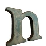Blue metal letter "N"