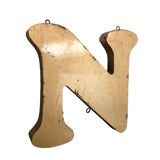 Golden sign letter "N"