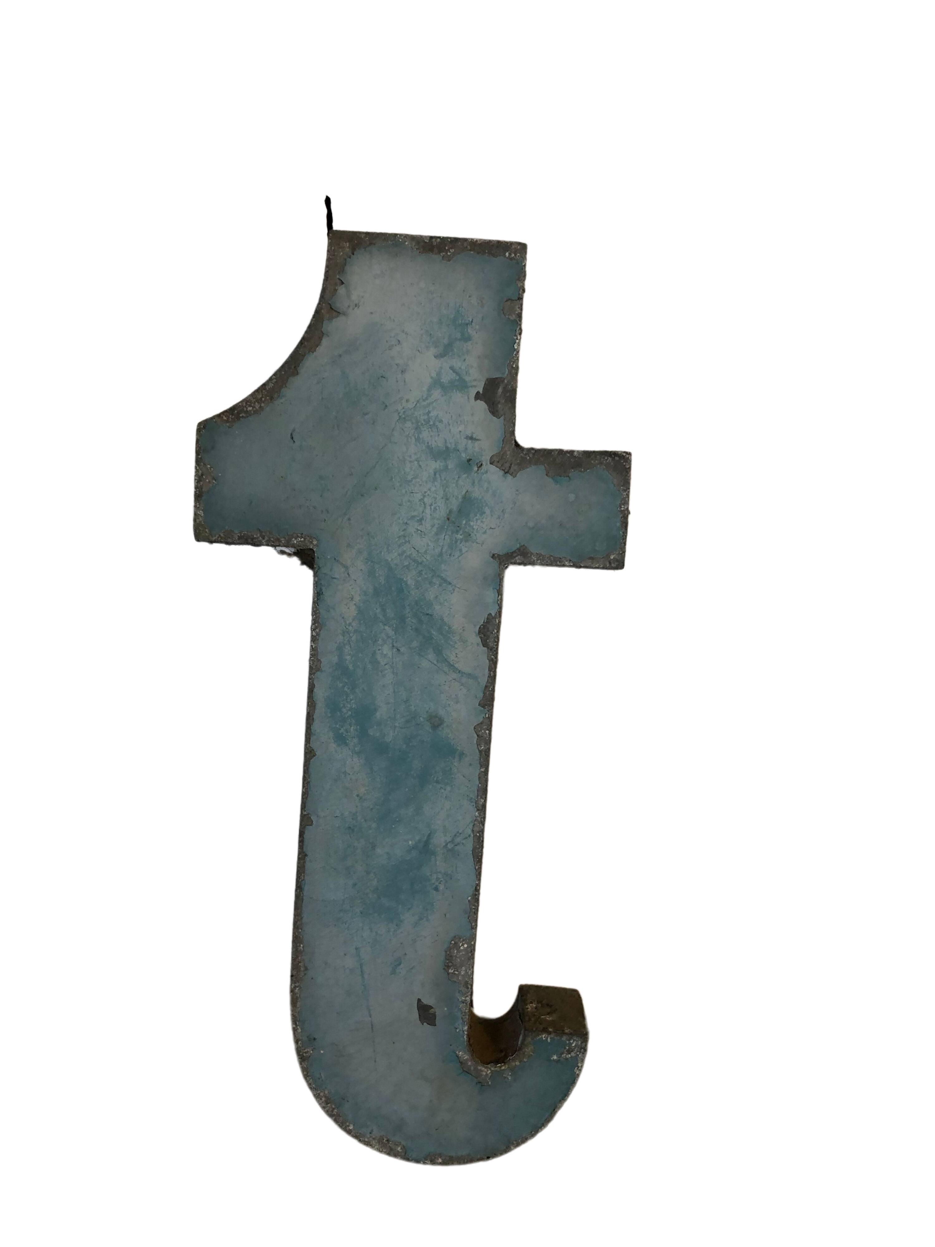 Blue sign letter "T"